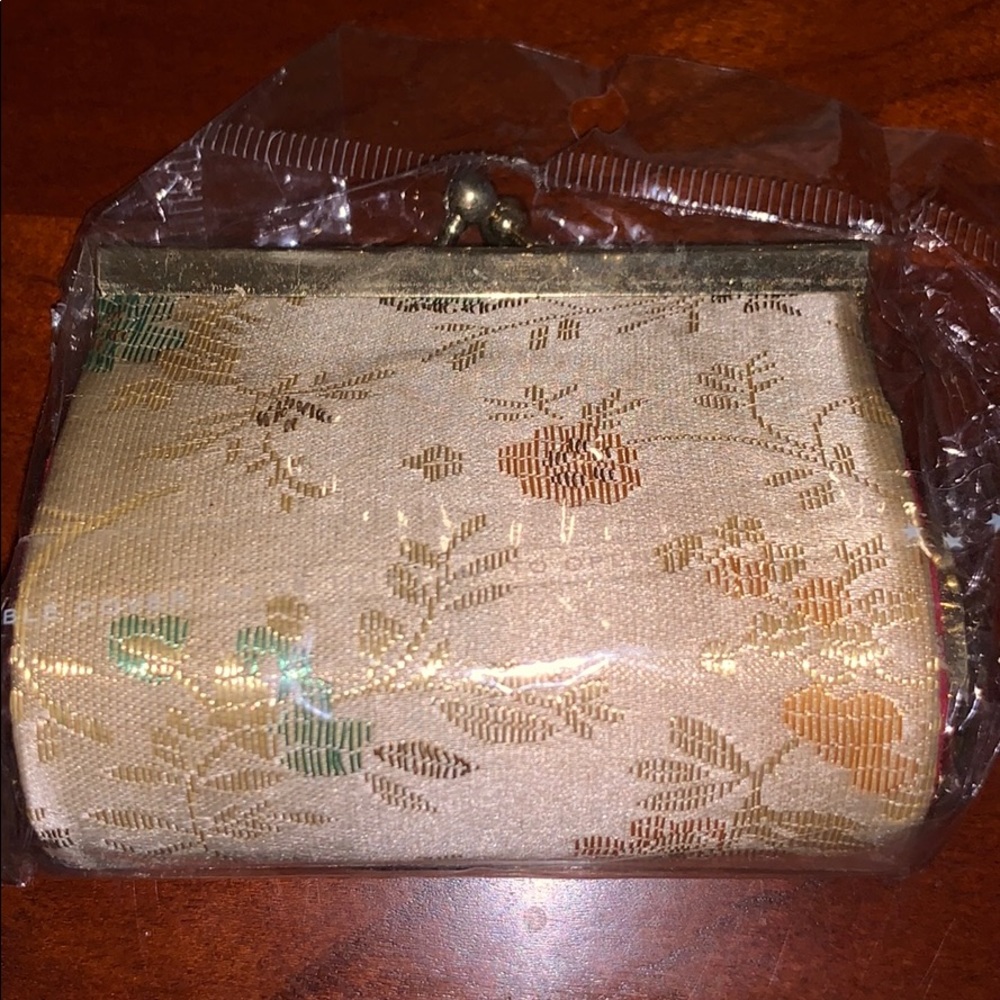 Change Purse in original packaging.